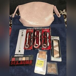 New makeup bundle with gently used cosmetic bag